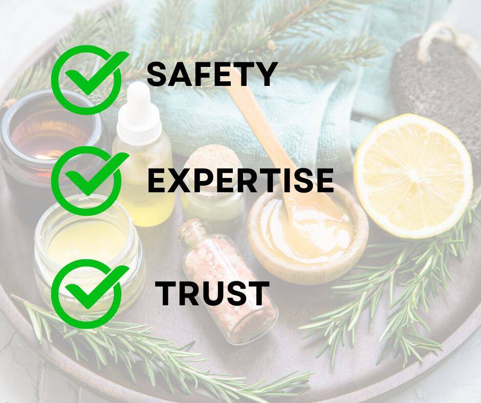 Faded image of a tray of natural beauty products over it are written words safety: expertise: and trust for our beauty training manuals